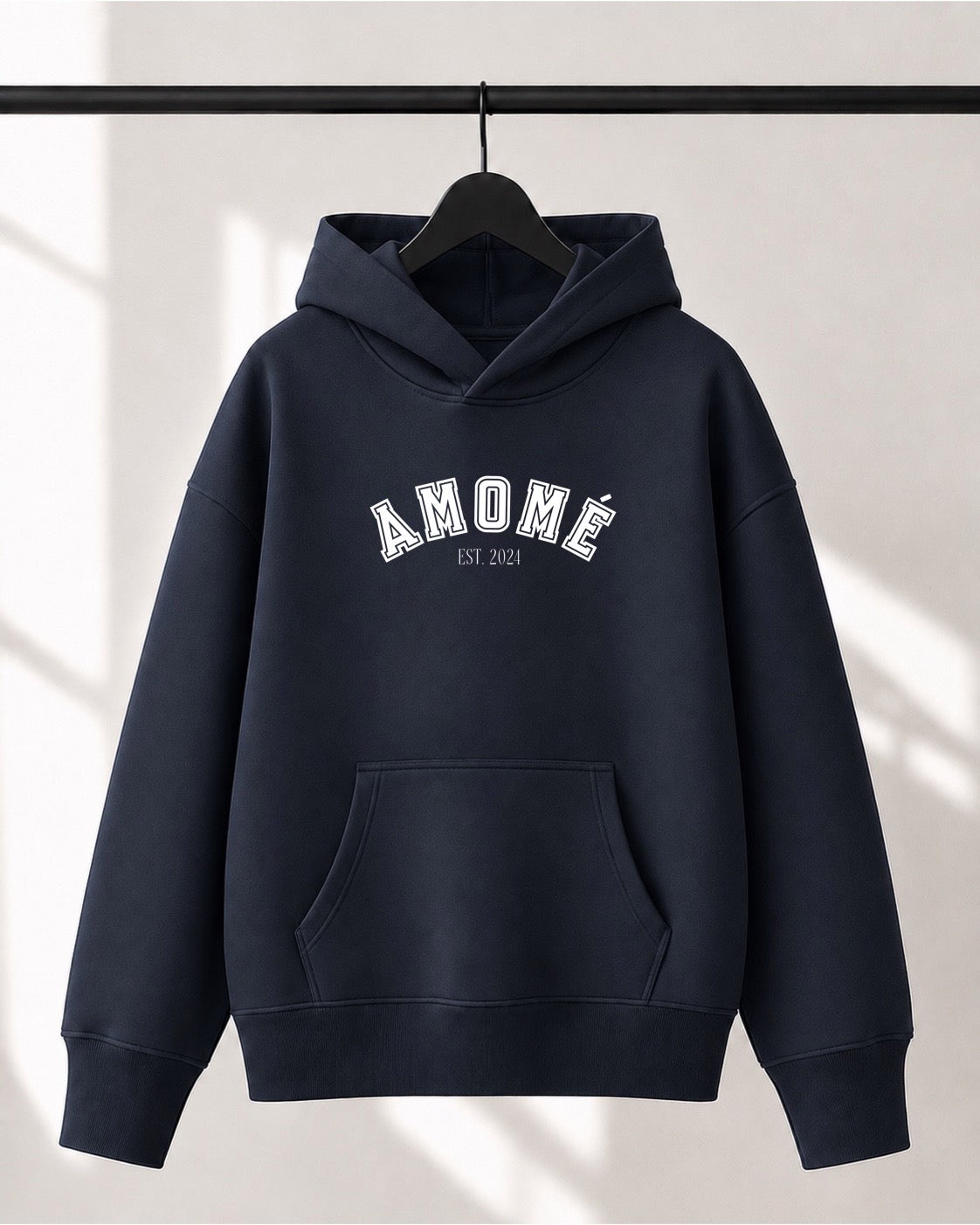 Hoodie Lusso unisexe «Amomé EST. 2024»