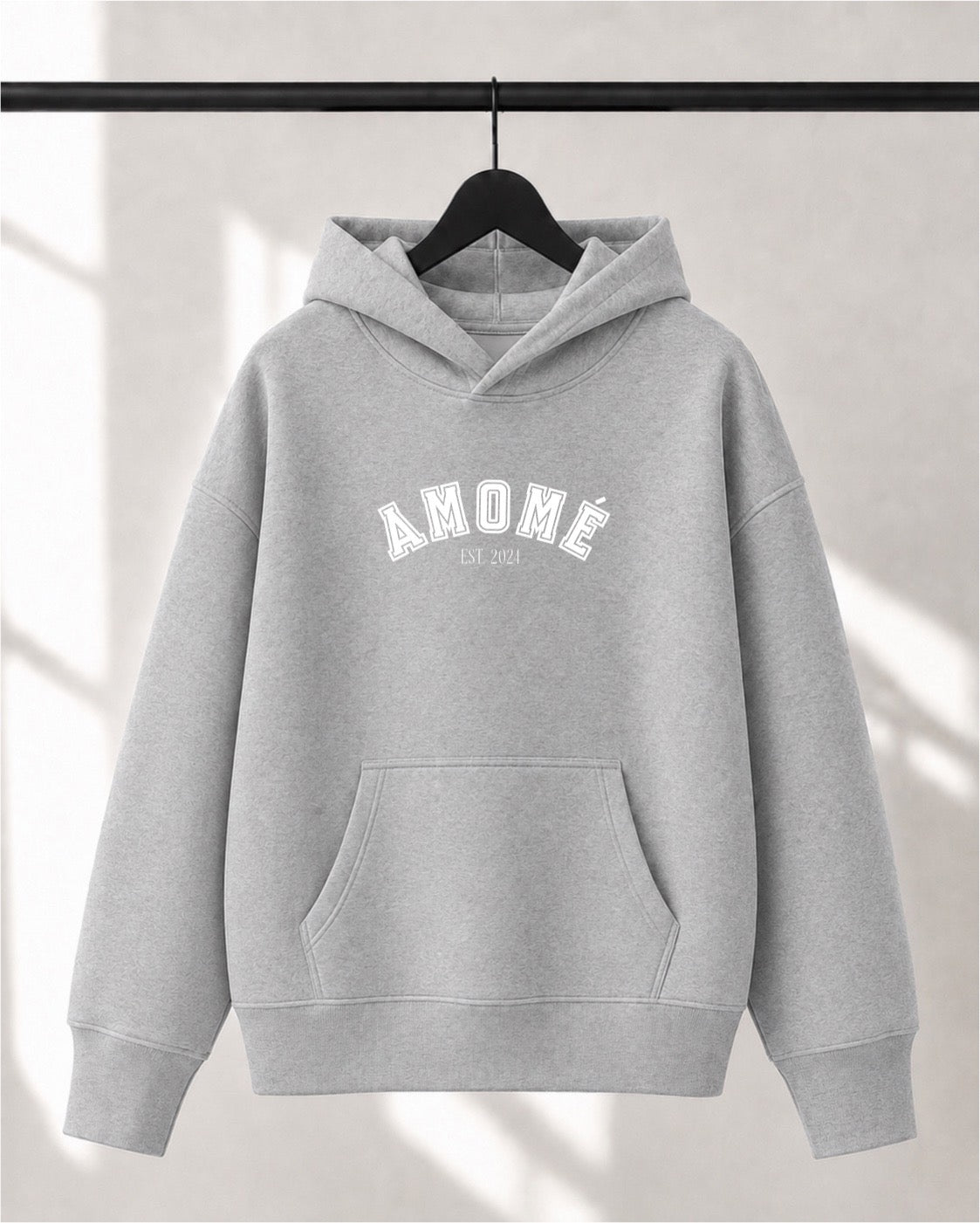 Hoodie Lusso unisexe «Amomé EST. 2024»