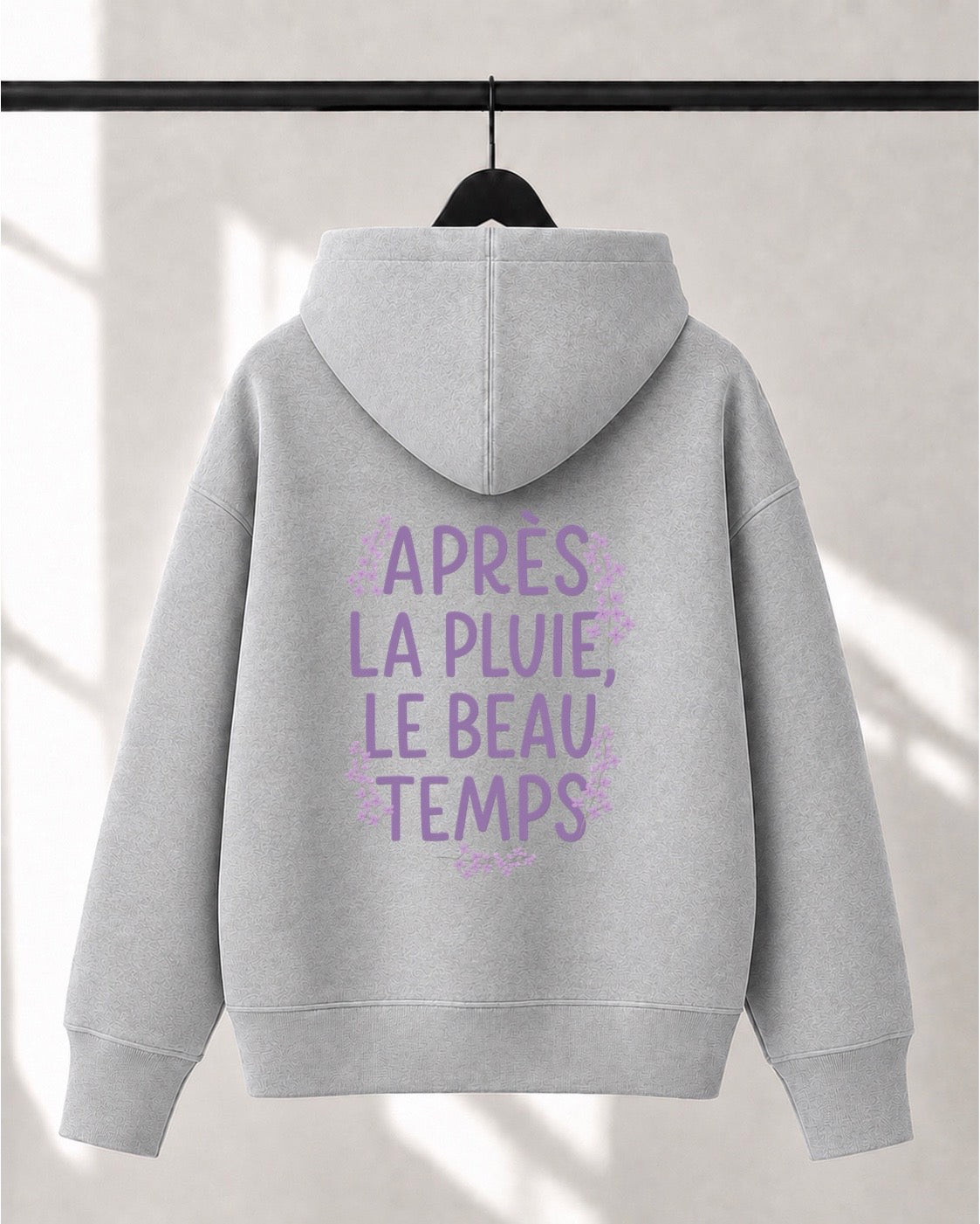 Hoodie Lusso unisexe «Après la pluie, le beau temps»